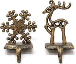Metal reindeer & snowflake Christmas stocking holders. Set of 2. Vintage decor.